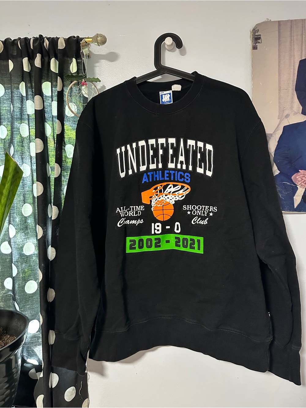 Undefeated Black Crewneck Sweatshirt with Orange & Green Basketball Graphic